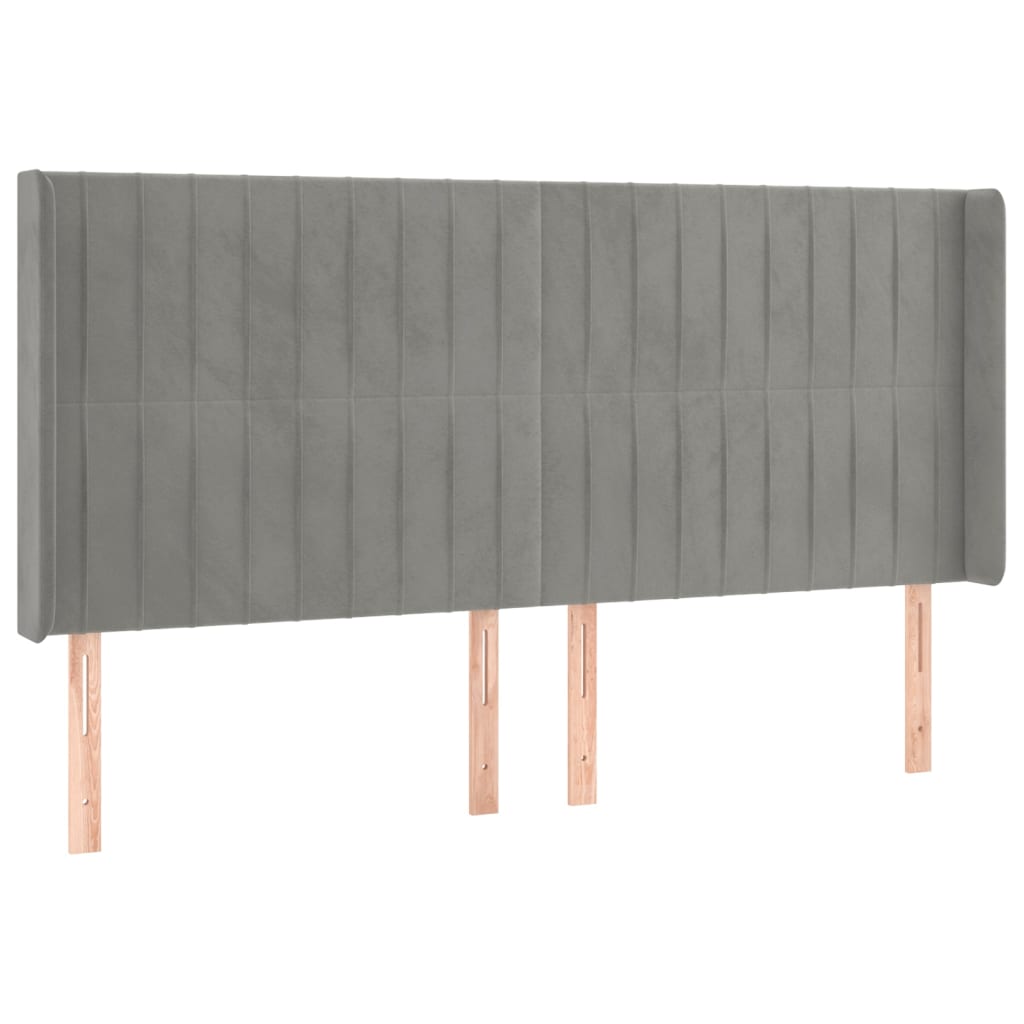 Hoofdbord met randen 163x16x118/128 cm fluweel lichtgrijs is nu te koop bij PeponiXL, paradijselijk wonen!
