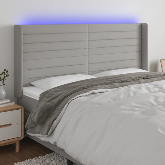 Hoofdbord LED 203x16x118/128 cm stof lichtgrijs is nu te koop bij PeponiXL, paradijselijk wonen!