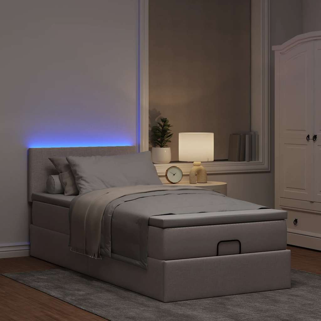 Ottoman bed met matras en LED's 90x190cm stof taupe