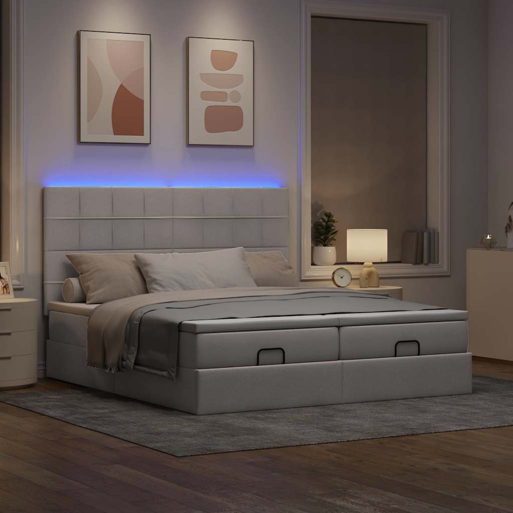 Ottoman bed met matrassen en LED's 180x200cm stof taupe