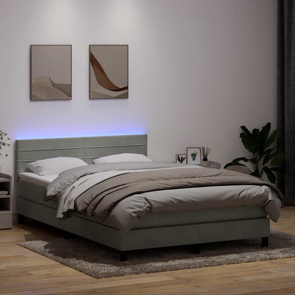 Boxspring met matras en LED fluweel lichtgrijs 140x210 cm