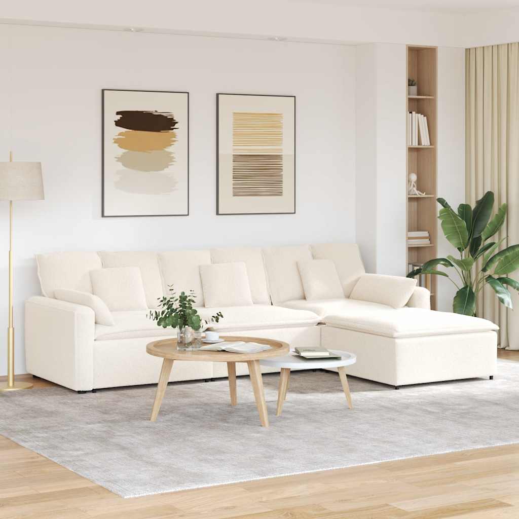 Modulaire bank met voetenbank en kussens crèmekleurig