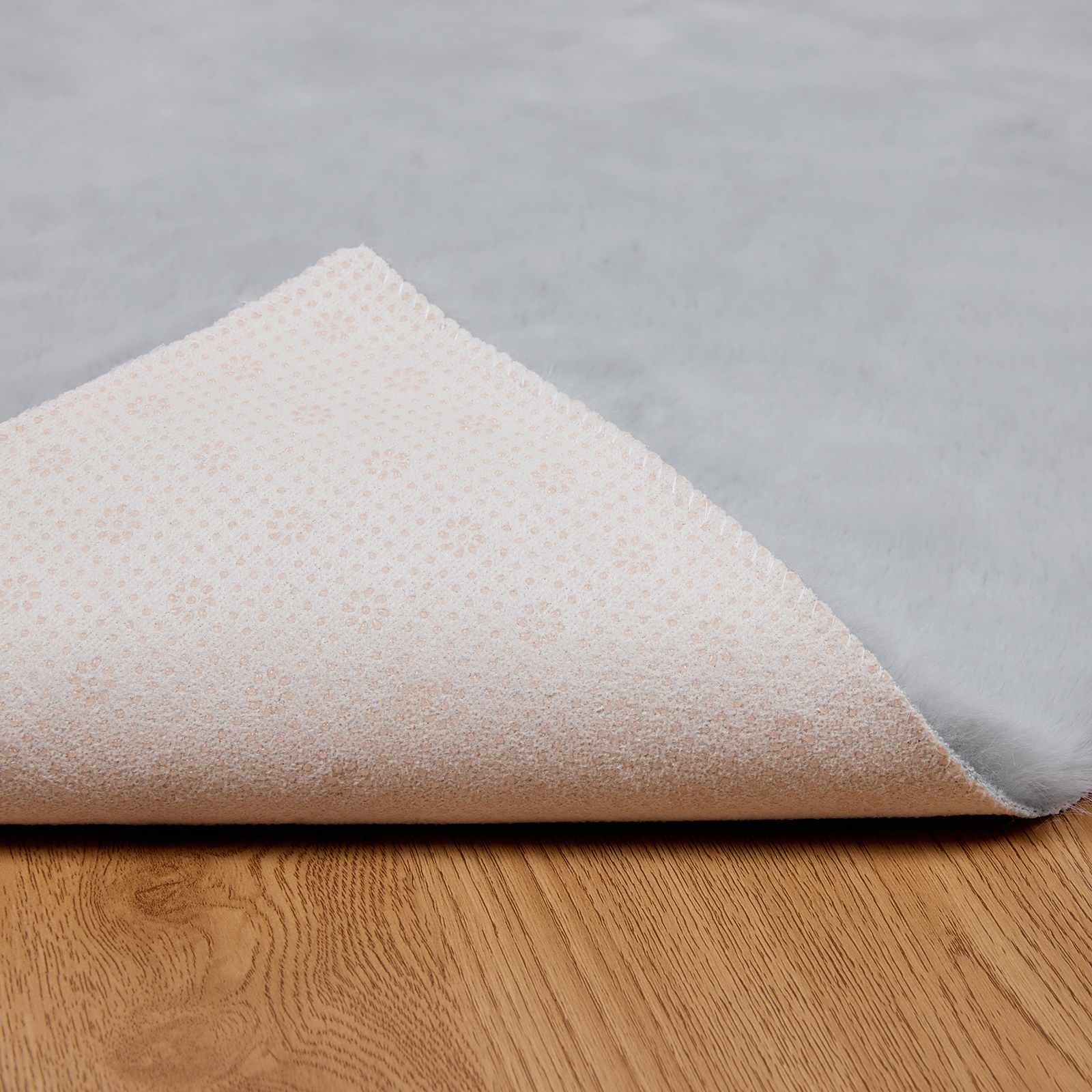 Antislip neplederen konijnenbont vloerkleed Olite Grijs is nu te koop bij PeponiXL, paradijselijk wonen!