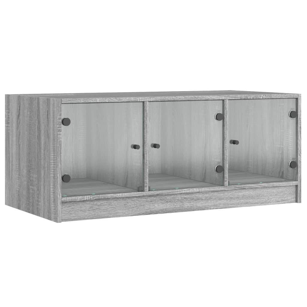 Salontafel met glazen deuren 102x50x42 cm grijs sonoma eiken is nu te koop bij PeponiXL, paradijselijk wonen!