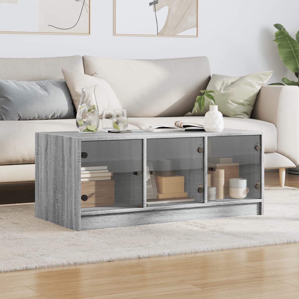 Salontafel met glazen deuren 102x50x42 cm grijs sonoma eiken is nu te koop bij PeponiXL, paradijselijk wonen!