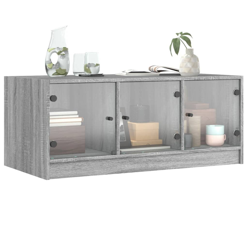 Salontafel met glazen deuren 102x50x42 cm grijs sonoma eiken is nu te koop bij PeponiXL, paradijselijk wonen!