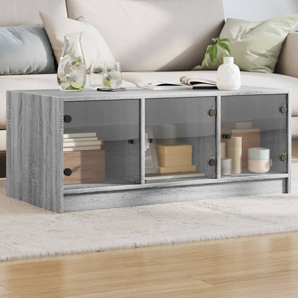 Salontafel met glazen deuren 102x50x42 cm grijs sonoma eiken is nu te koop bij PeponiXL, paradijselijk wonen!